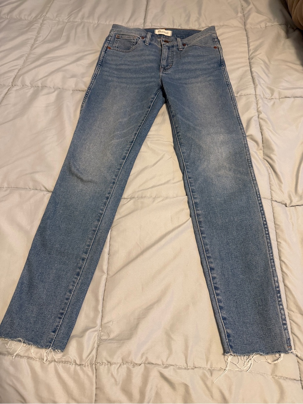 Madewell Straight Leg Jeans in Light Blue Denim measures 28 inches